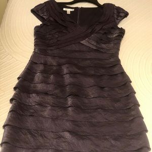 Dark purple ruffled dress worn once. Super cute!